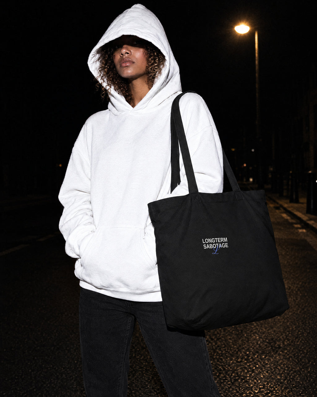 LONGTERM SABOTAGE Large Tote, Black, worn, night street